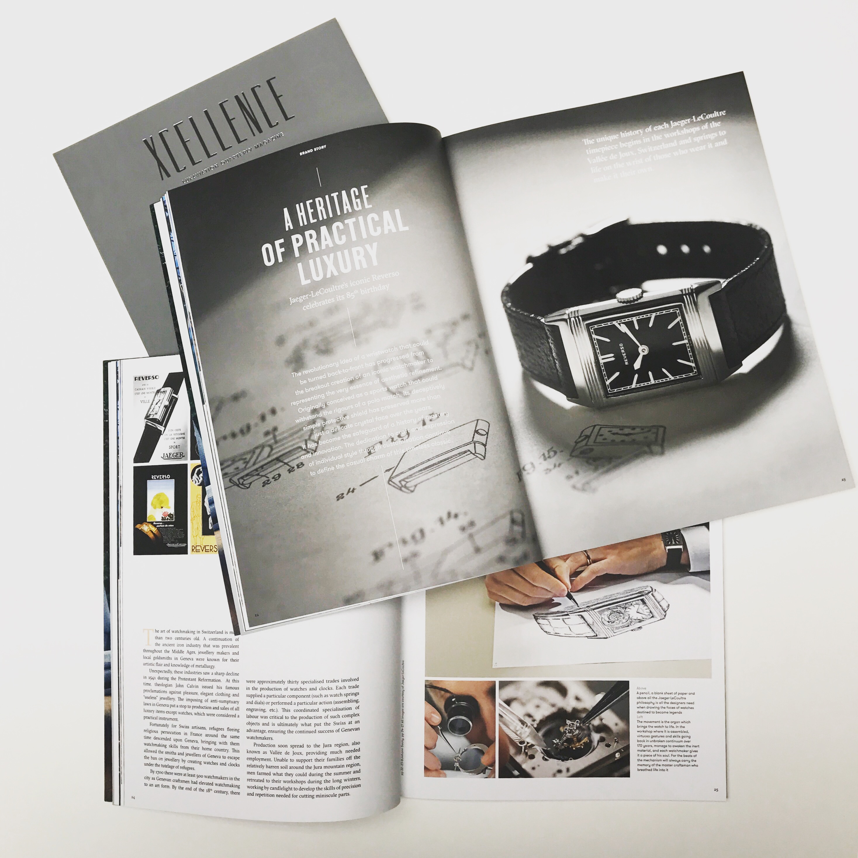 hands holding a high-quality print publication as part of a tangible brand marketing strategy